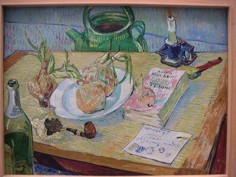 Still life with a plate of onions